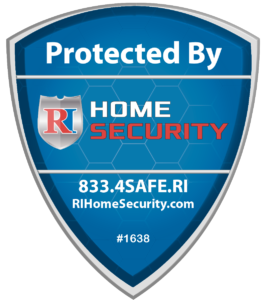 An image featuring a yard sign with the RI Home Security logo and phone number printed on it.